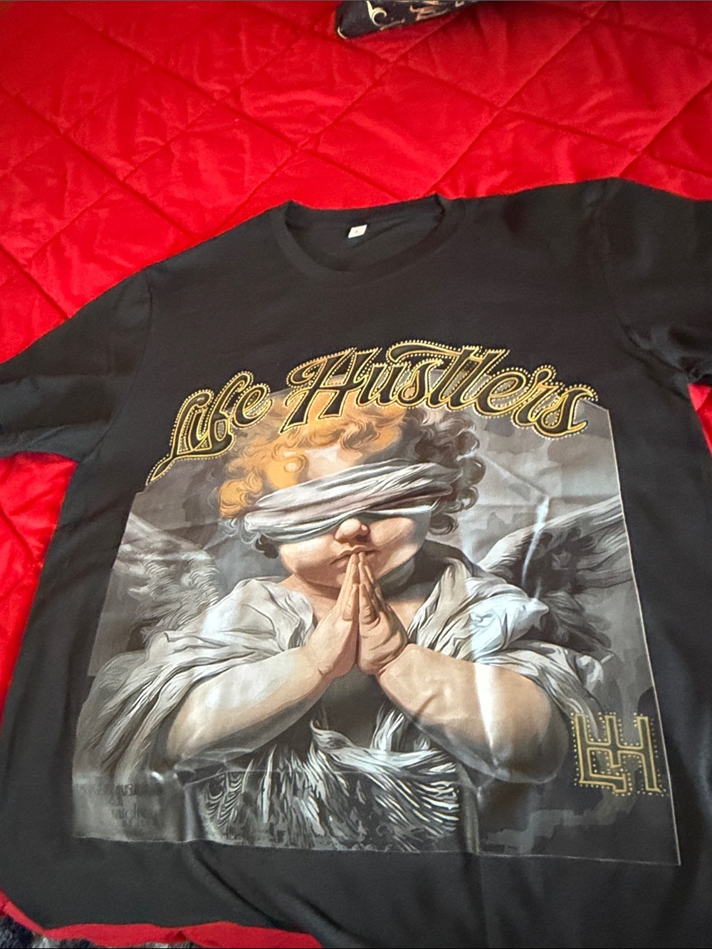 Hustler Hollywood Black Tee with Gold Lettering & Angel Graphic